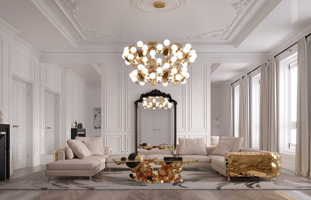 gold cofee table, gold chandelier and nude sofa with gold details