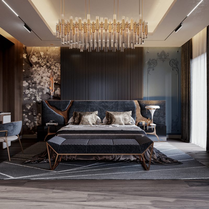 master deroom with lapiaz headboard in black,  a black ottoman and a gold suspension lamp