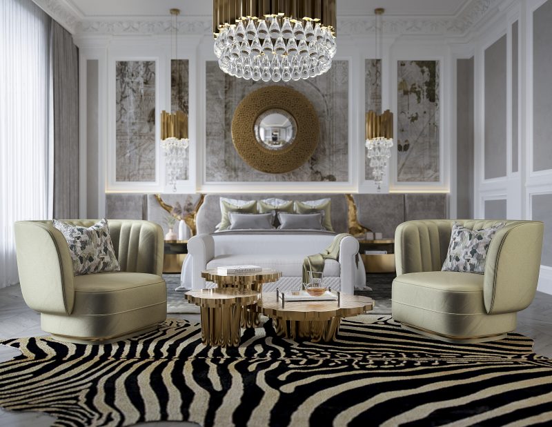 master bedroom with lapiaz headboard in grey velvet newton mirror, fortuna center table in gold and two beige harmchairs