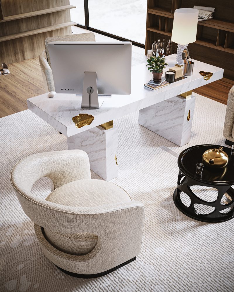 home office with marble desk with gold details, nude armchair and black coffe table