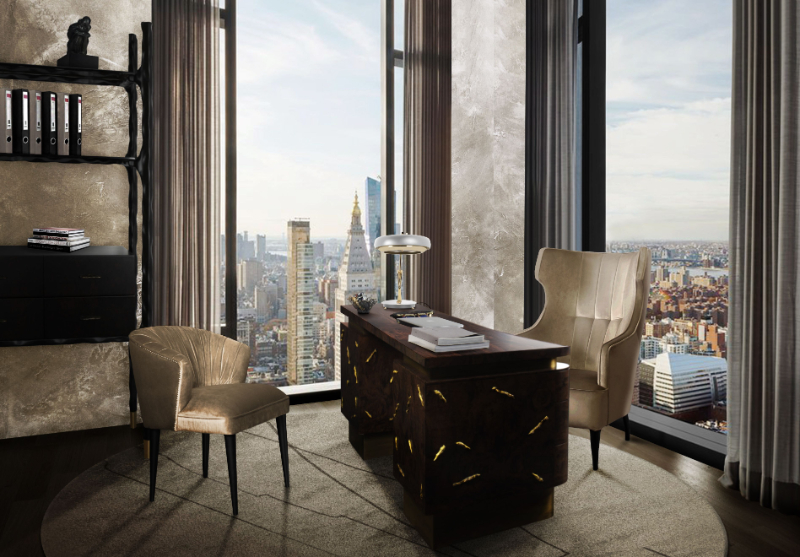 Baraka Desk’s main body is made in matte walnut root veneer and covered with nature-inspired brass detail.