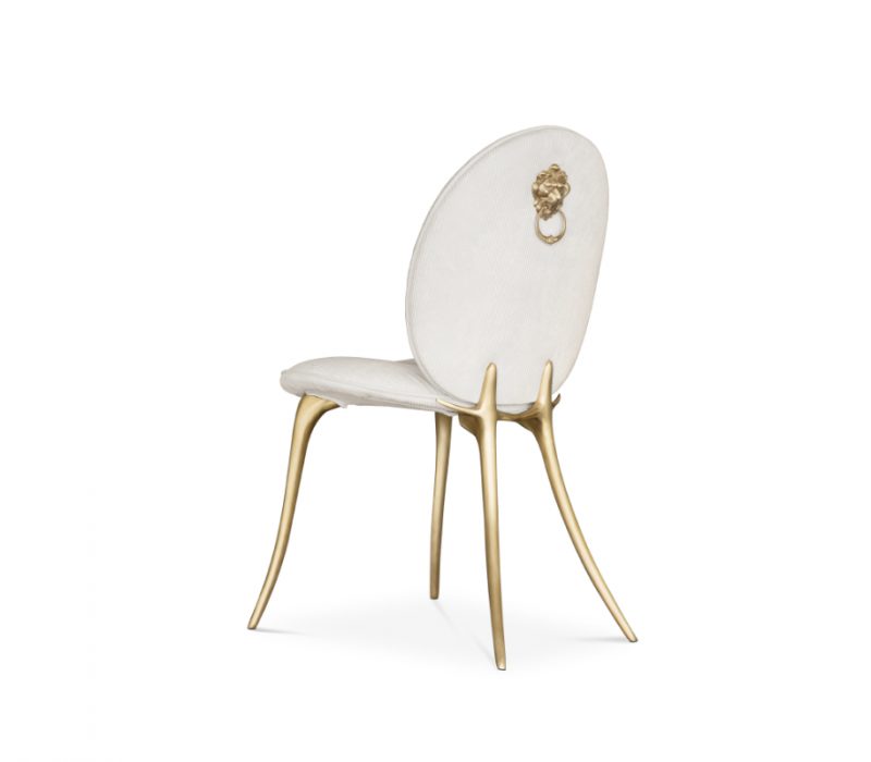  maximalism- cream chair with gold details 